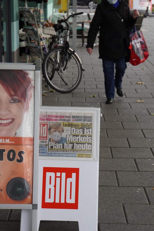 Bild-Zeitung. Lockdown-Gipfel. Das ist Merkels Plan für heute. Maske